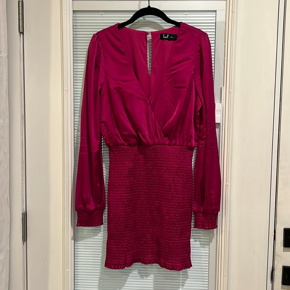 New still in bag. Bought two sizes and the other fit best. This one is Large.